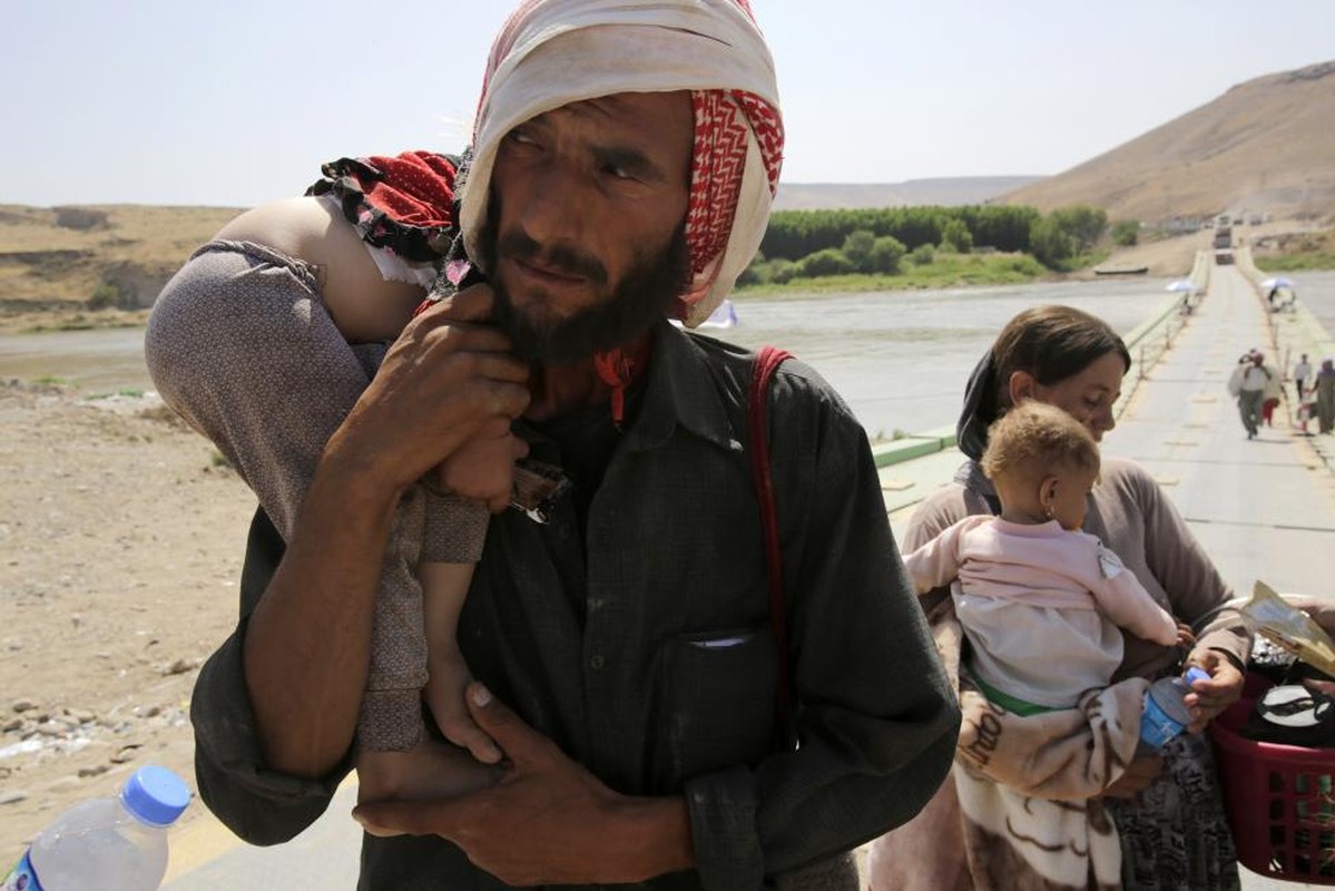 Cong dong nguoi Yazidi: Bi IS truy buc va vung len danh tra-Hinh-15